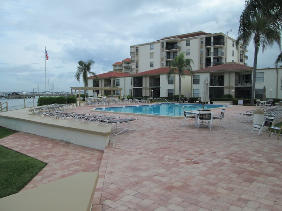 Pool and hot tub overlooking water