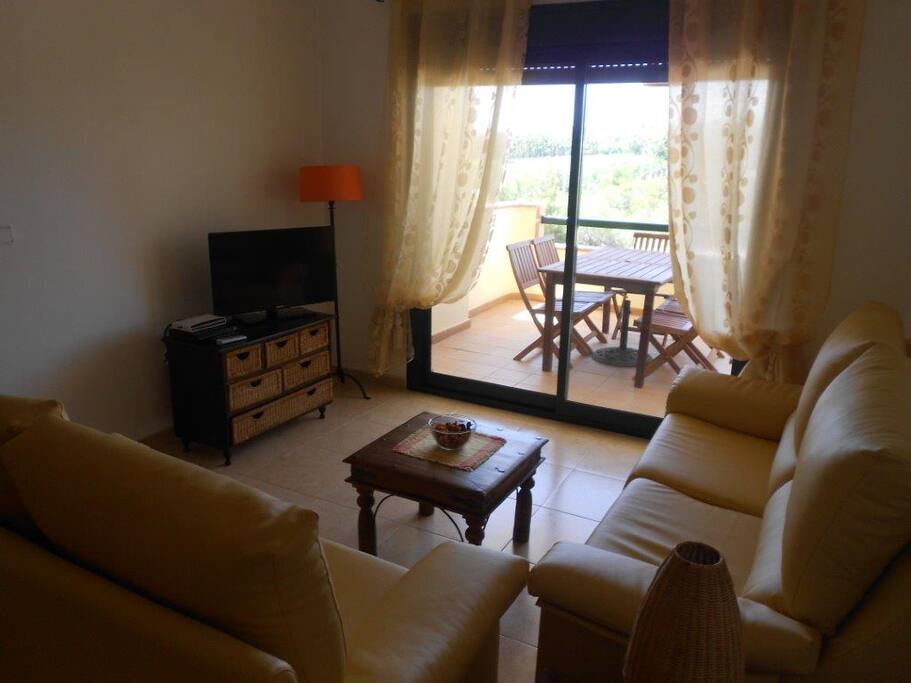 Lounge area leading onto balcony