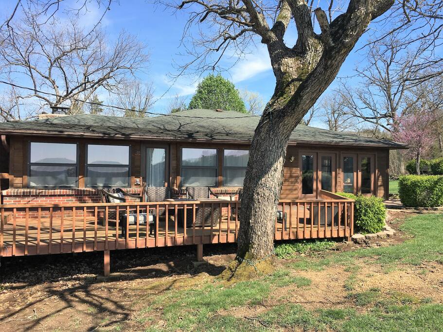 The back of the house overlooking the lake. Lots of windows and natural light.