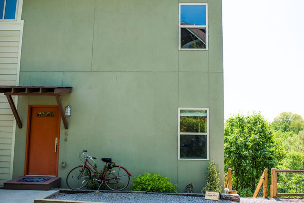 Front of our home. If you need us, knock on the orange door:)