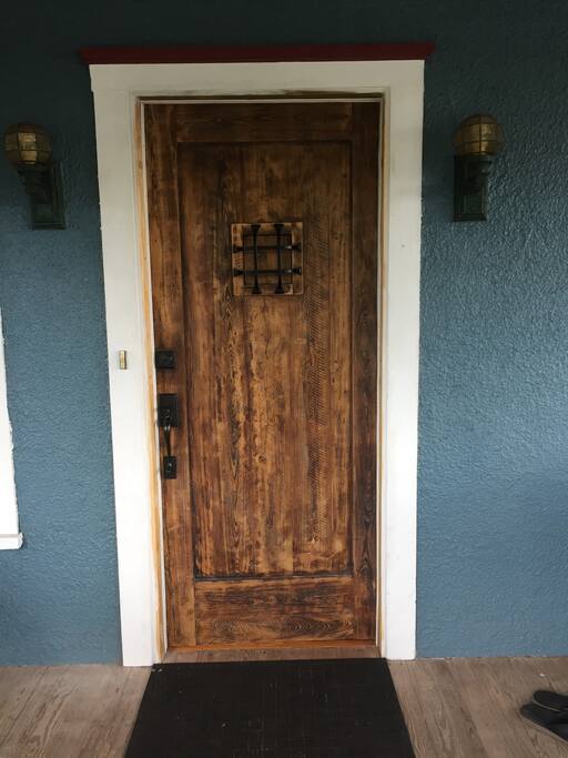 Front door with speakeasy window