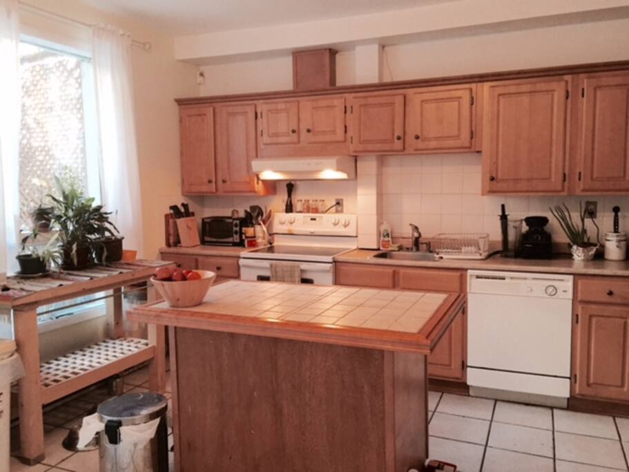 A HUGE kitchen to cook and hang out, with direct access to the porch.