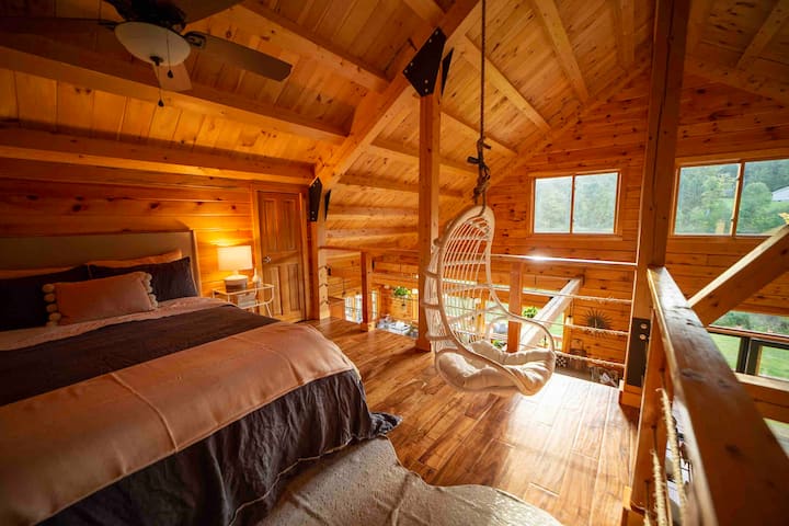 Open Loft bedroom with hanging pod chair. The most fun room with a birds eye view and fun touches


Picture by https://instagram.com/dirtandglass?igshid=1q6mv34t1k149