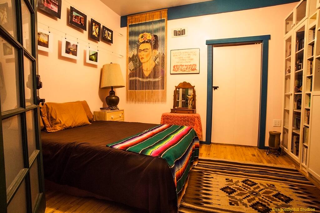 Frida Room with a door going into the Phoenix Room.