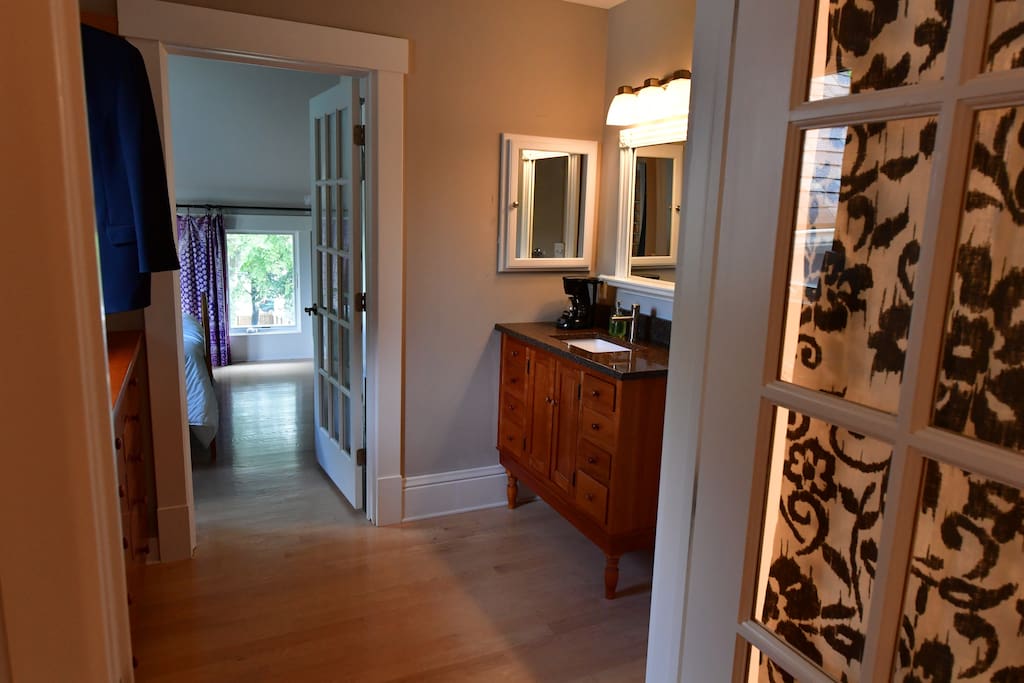 This is the middle room of the three-space suite. The entrance into this suite from the main house is just the right of the vanity.