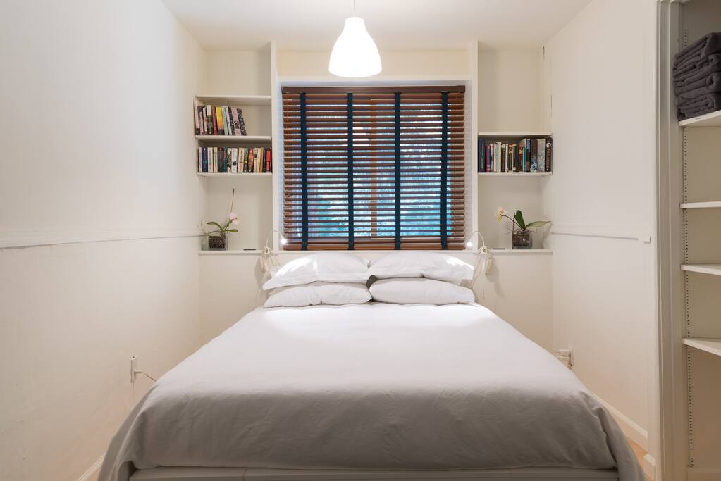 Private separate bedroom with queen bed and mattress warmer.