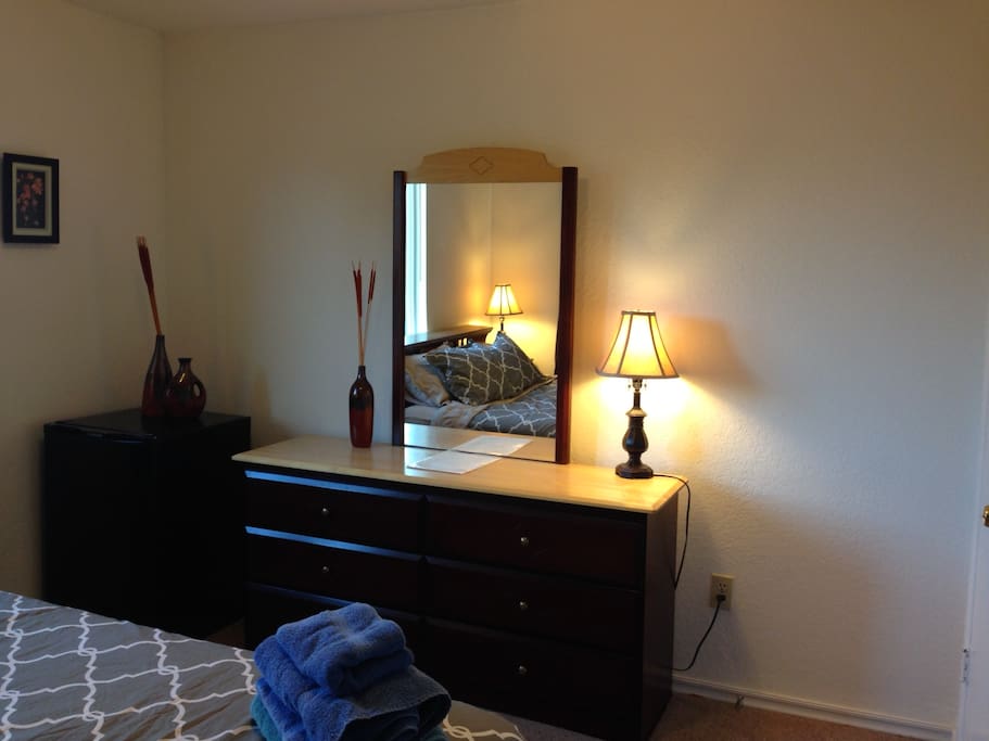 Dresser with mirror and tons of drawers for storage