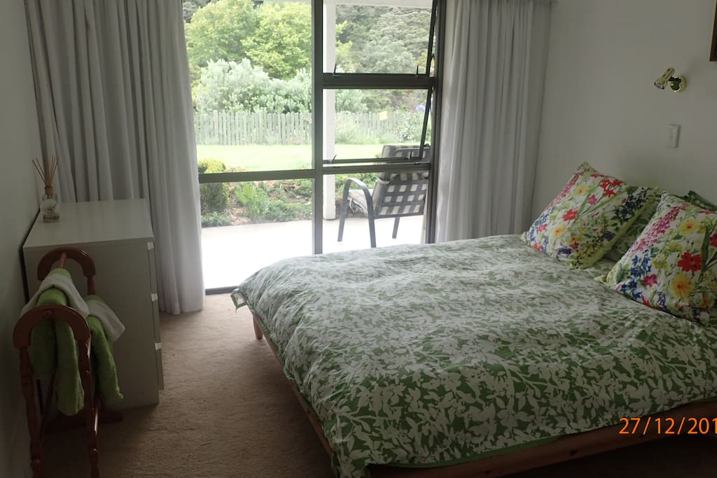 Bedroom opens onto covered patio