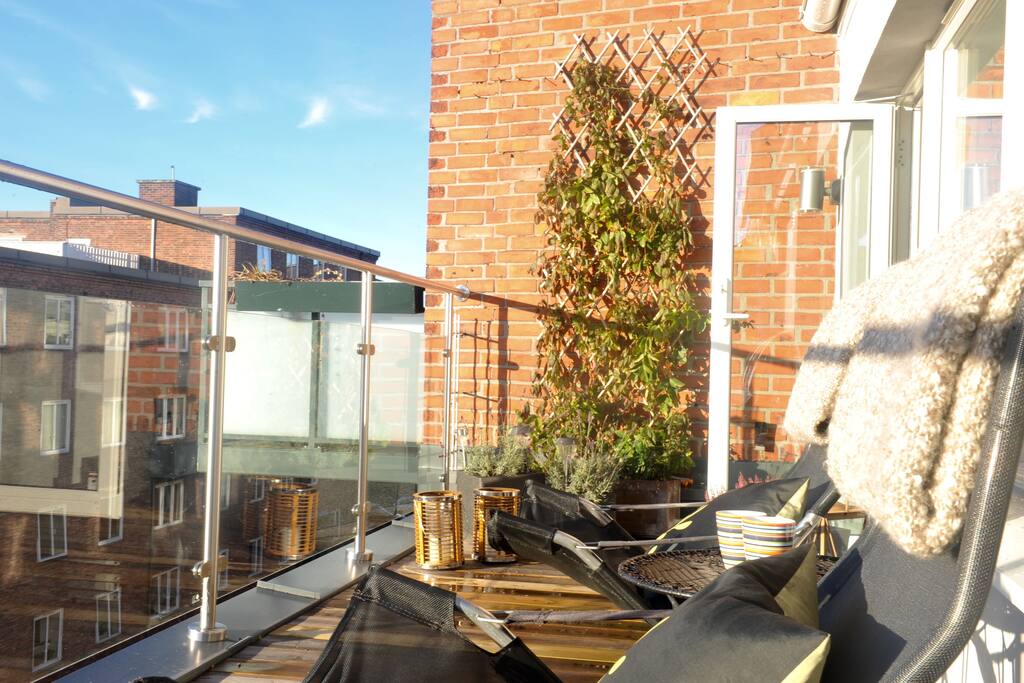 Sunny, private rooftop terrace with great sea view.