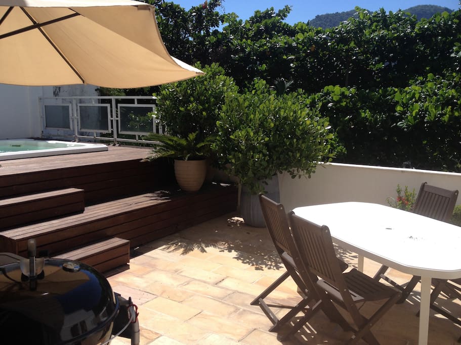 Terrace with small pool and barbecue grill.