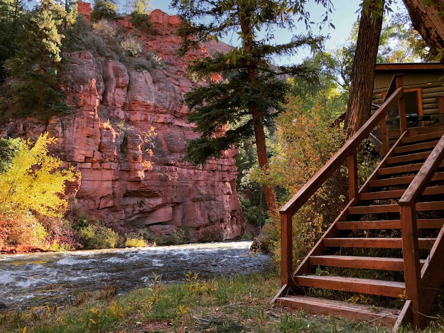 Staircase leading from the cabin to the river