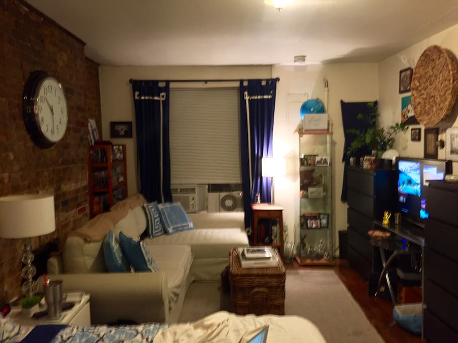 Sectional couch converts into an additional bed.