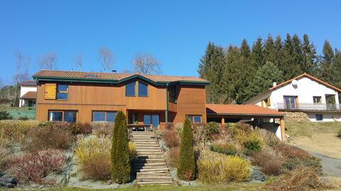 Wooden frame vacation home with lake view