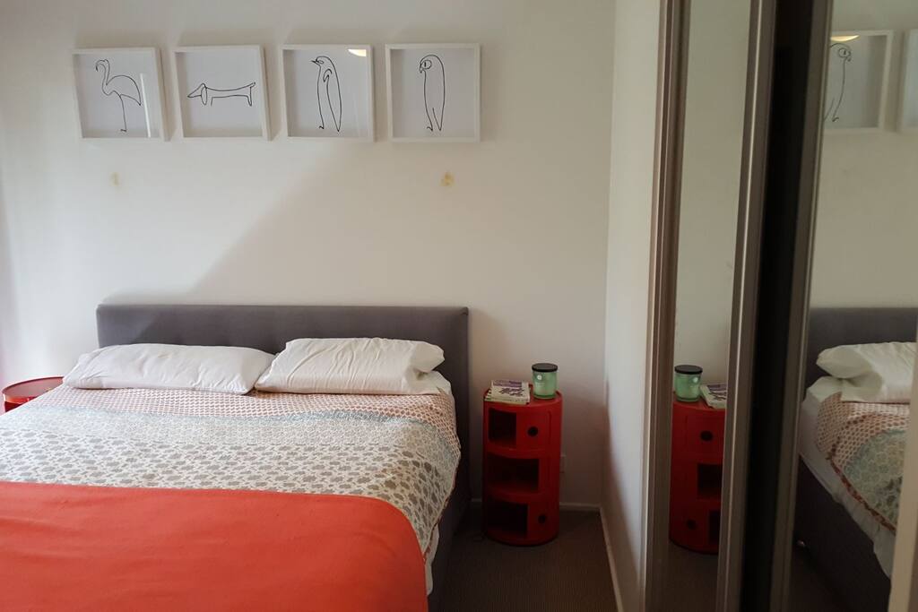 Queen bed. Blackout blinds on windows.