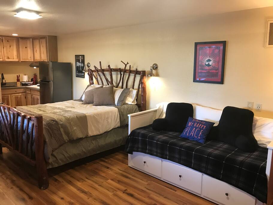Artisan queen bed, trundle couch (pulls out to queen size) and kitchenette (left). Sleeps 4 comfortably. Large 25' x 15' (375 sf)