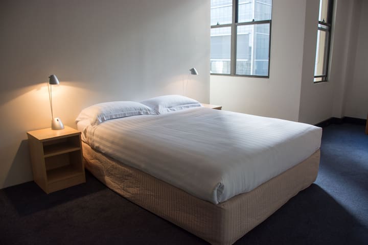 Private Queen Room w. shared bathroom in the city!