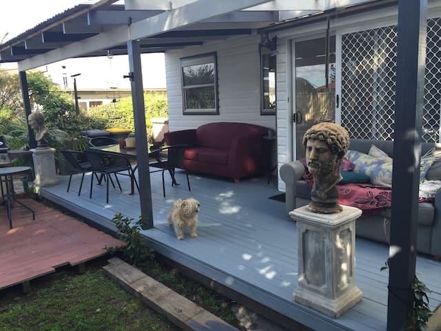 Caravan at rear of old beach house