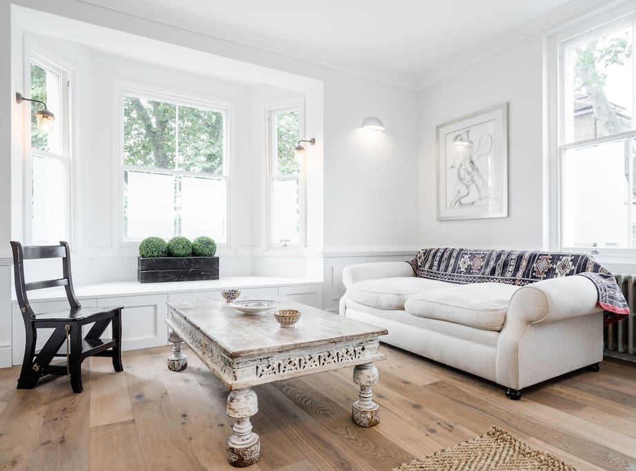 The living room has modern cotage vibes