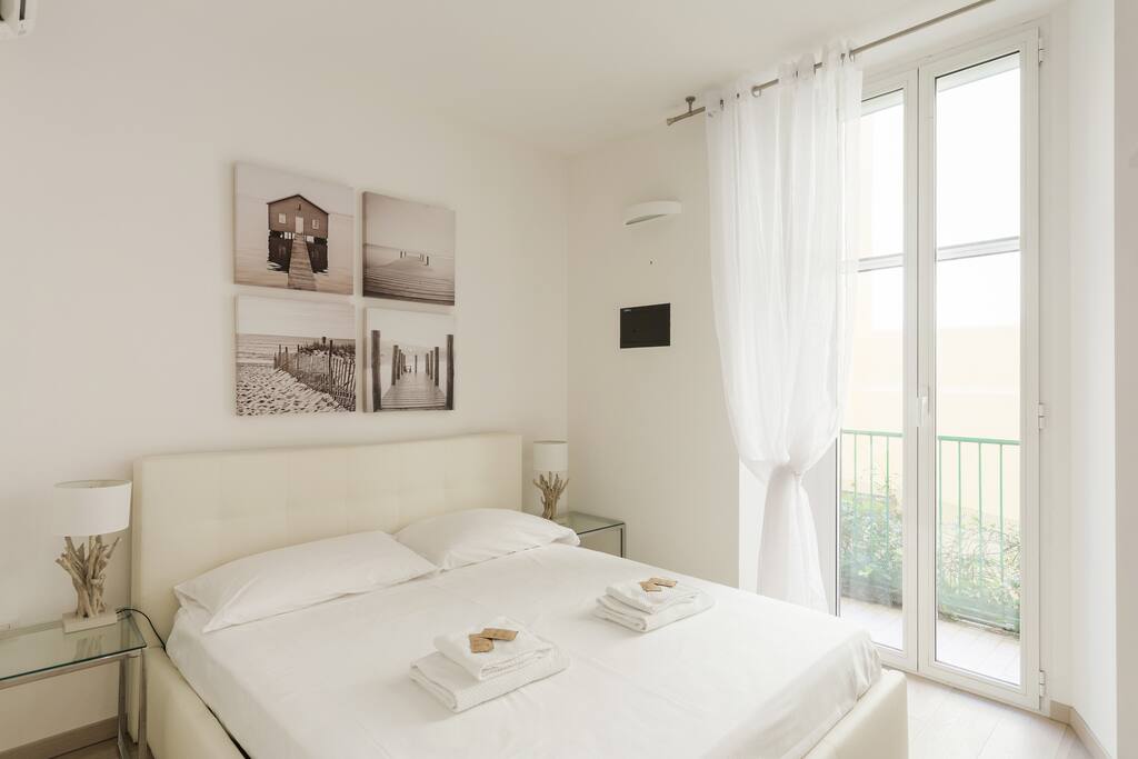 The Bedroom - The comfortable double bed with soft bed-linen and towels
