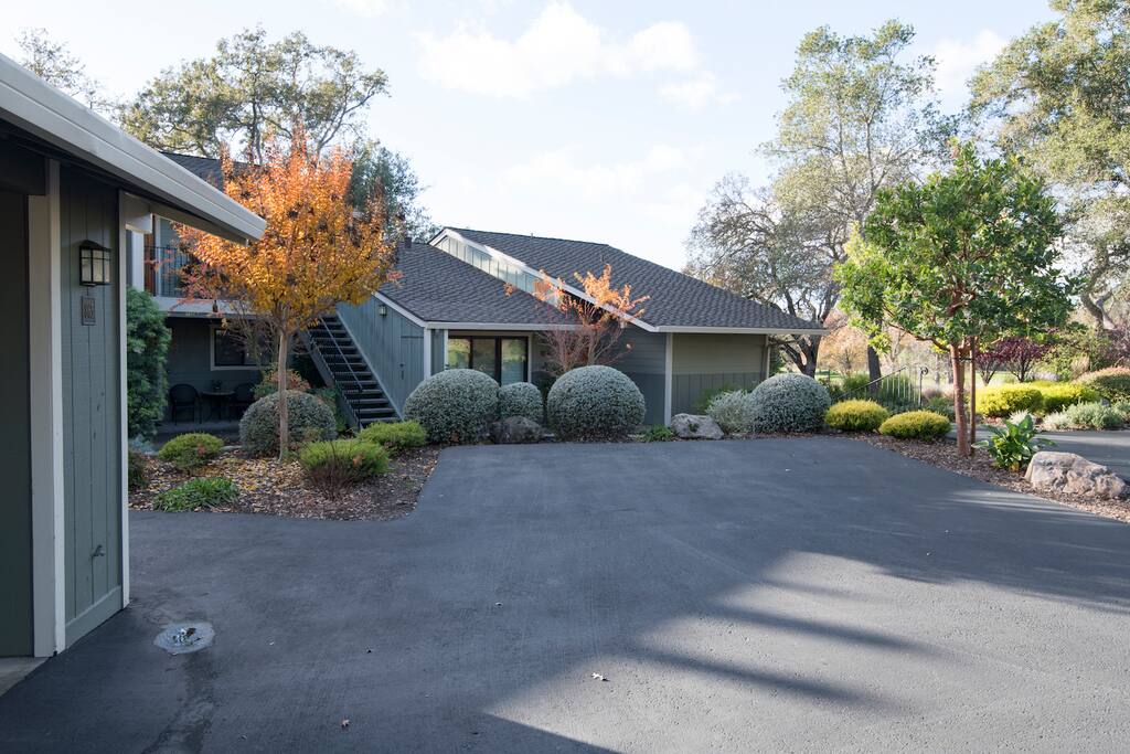 Park in front of condo outside or park in carport to the left