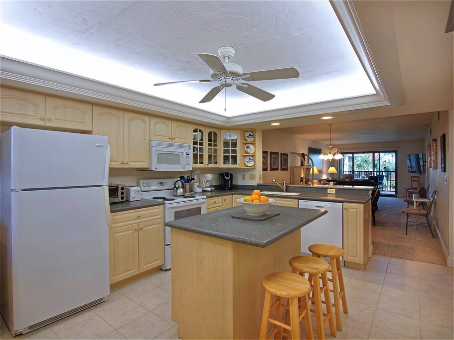 Updated, fully equipped kitchen with breakfast bar. Both Keurig and regular coffeemakers, toaster and griddle to make a big vacation breakfast and enjoy it on the lanai overlooking the Gulf!