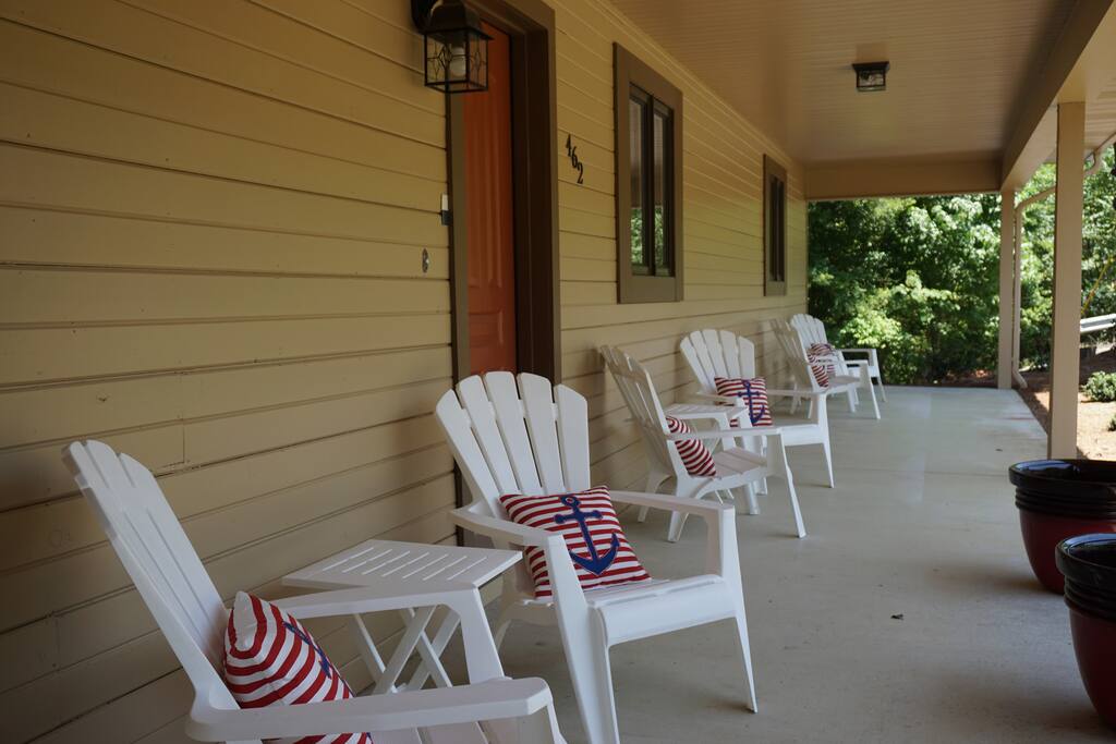 Spacious front porch with plenty of seating