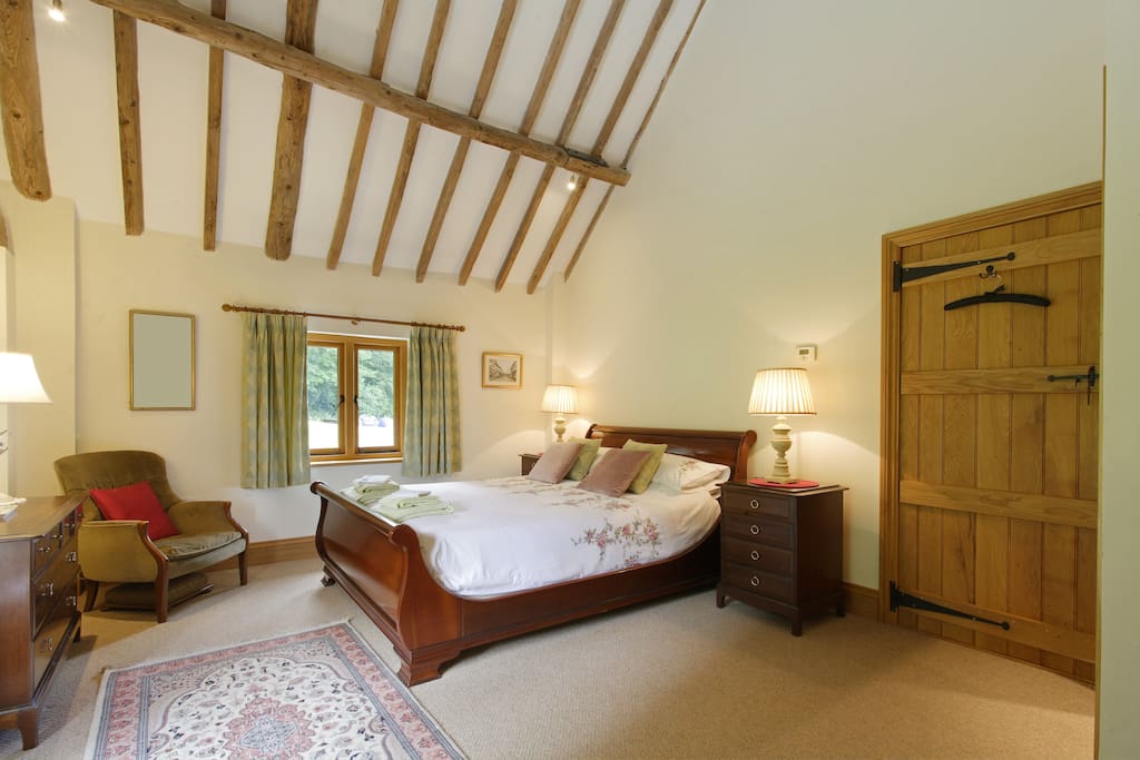 large beamed room with 5ft vispring double bed.