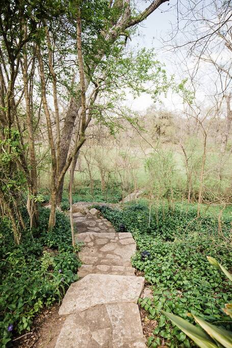 Stairs down to Pecan Grove with large fire circle