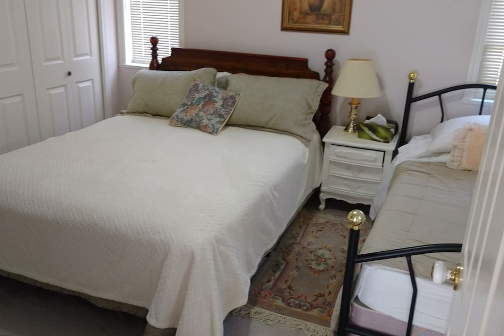 Room has 1 queen and 1 single bed.