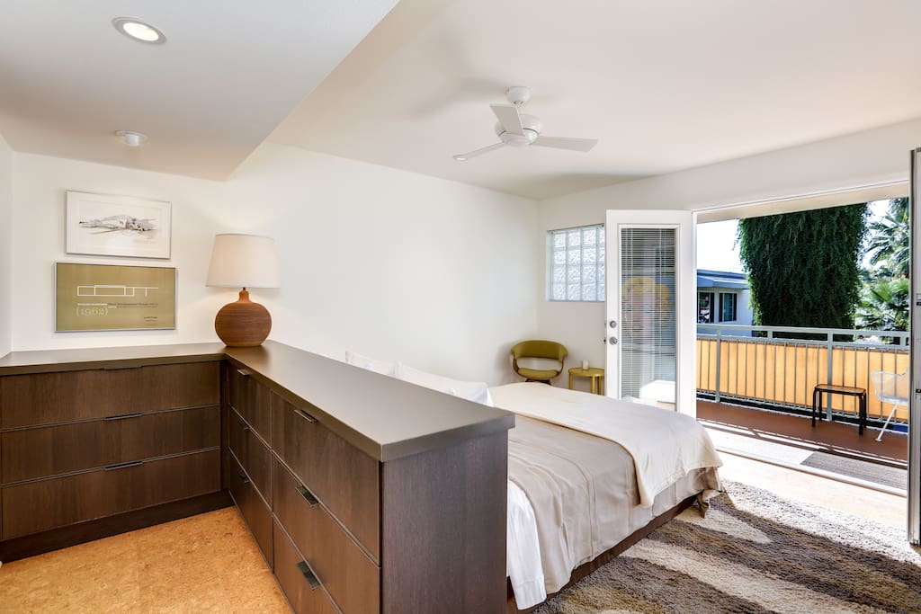 Abundant drawer space and wall to wall closet in bedroom.