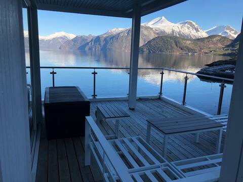 House touching the fjord