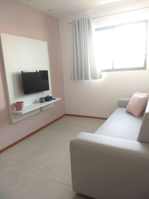 Sala com sofá cama
