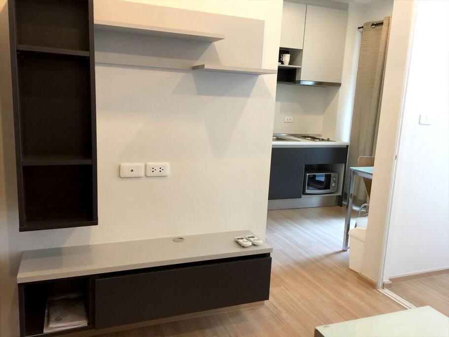 Living room area and kitchen