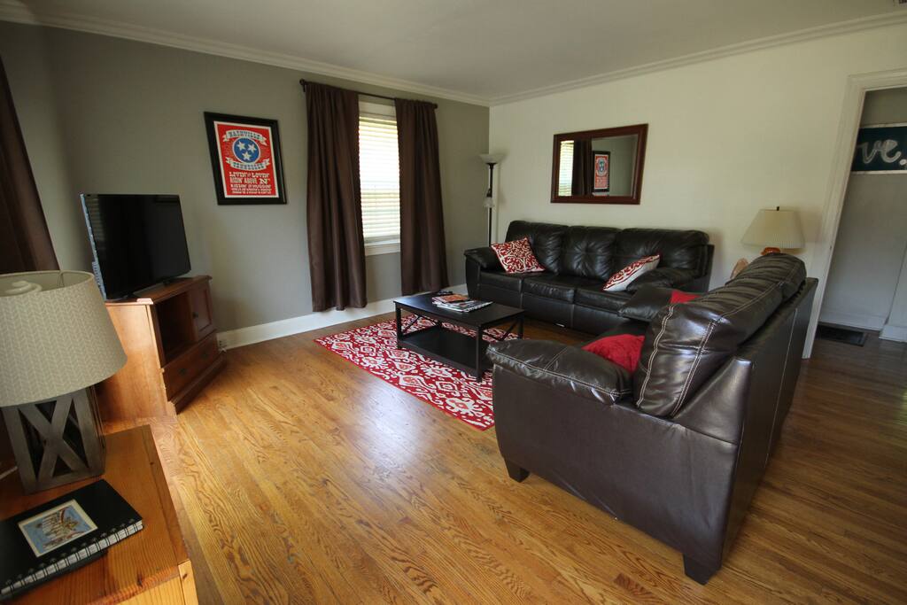 Big screen Roku TV, Blu-Ray, and Playstation 2! Leather sofa turns into a big ole bed!