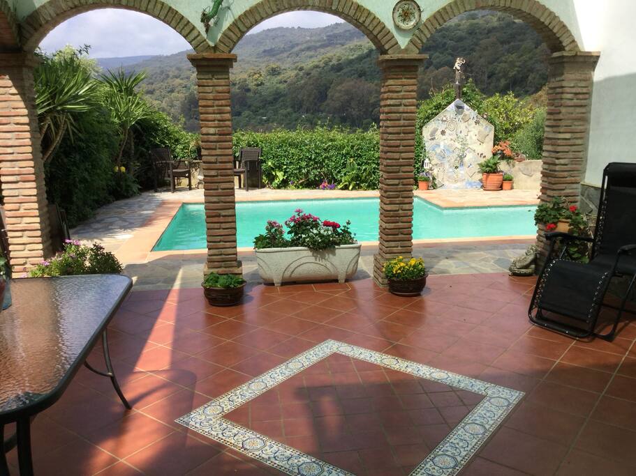 Kitchen terrace leading to pool and BBQ