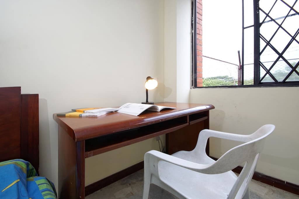 Main Room table with Lamp and Chair