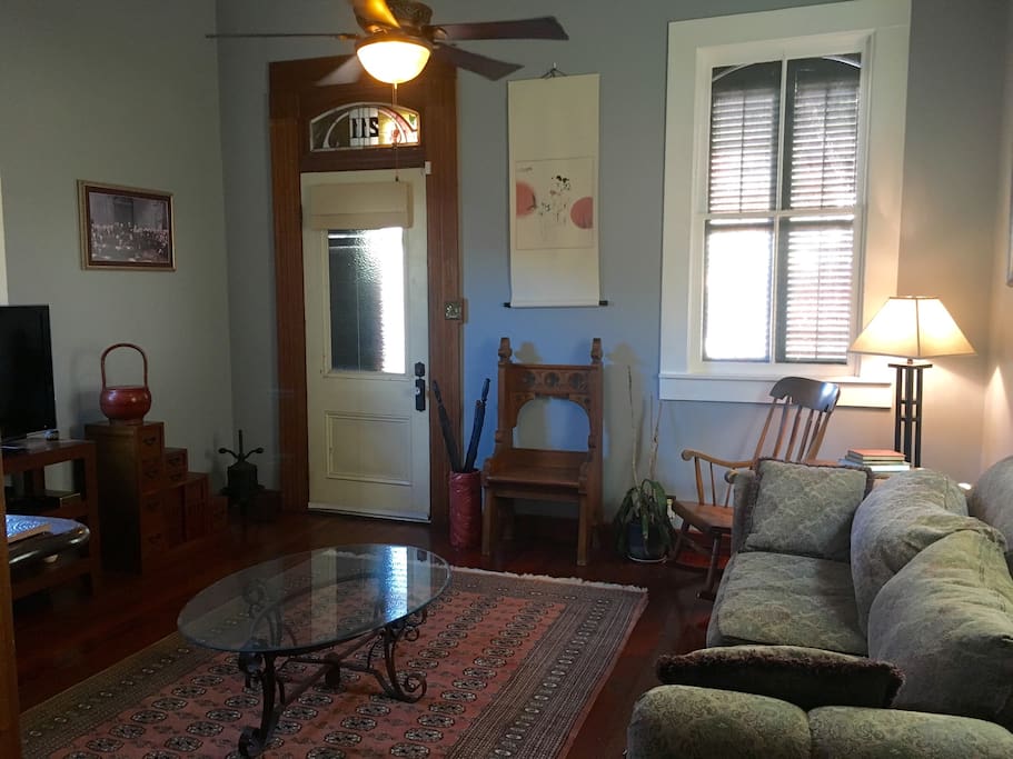 The front parlor is the living room with a large flat screen and cable.