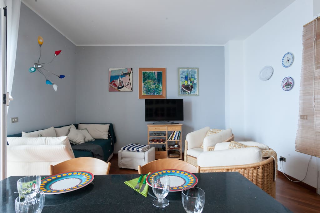 The living room | dining table & sofa bed x2