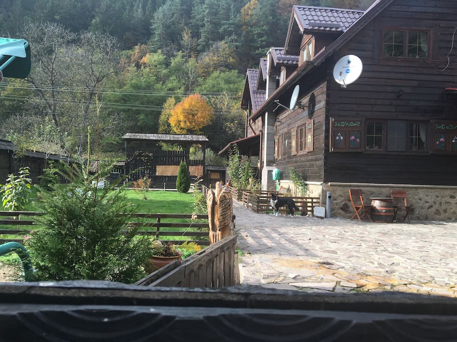 General view of the house and garden , main entrance