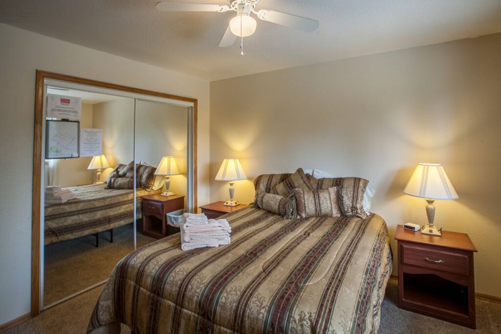 Extra pillows and blankets are located in the mirrored closet. Plus lots of area to hang your personal items.