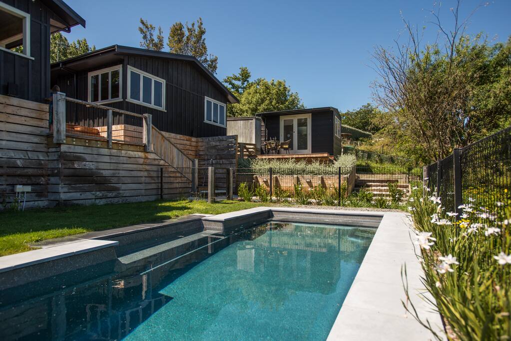 View back across the pool to the guest wing