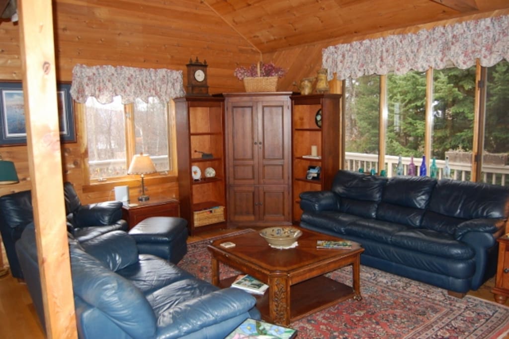 Leather furniture in the living room with west facing lake views