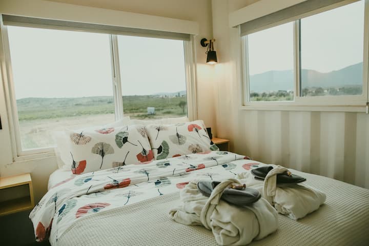 Queen size bed in one bedroom