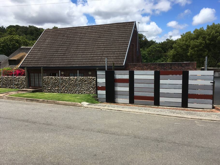 Parking for 2 cars behind remote controlled gate.