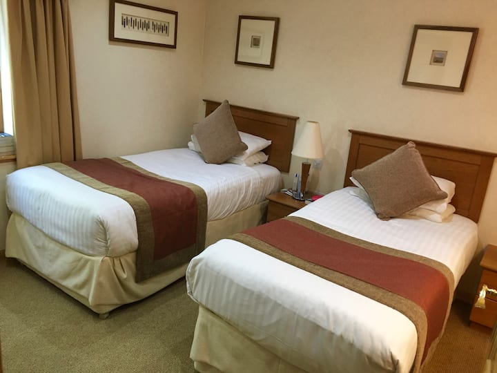 Double room with twin beds but no ensuite bathroom