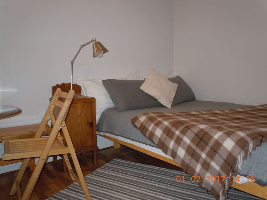 Comfy double bed, new mattress, wool and cotton linens