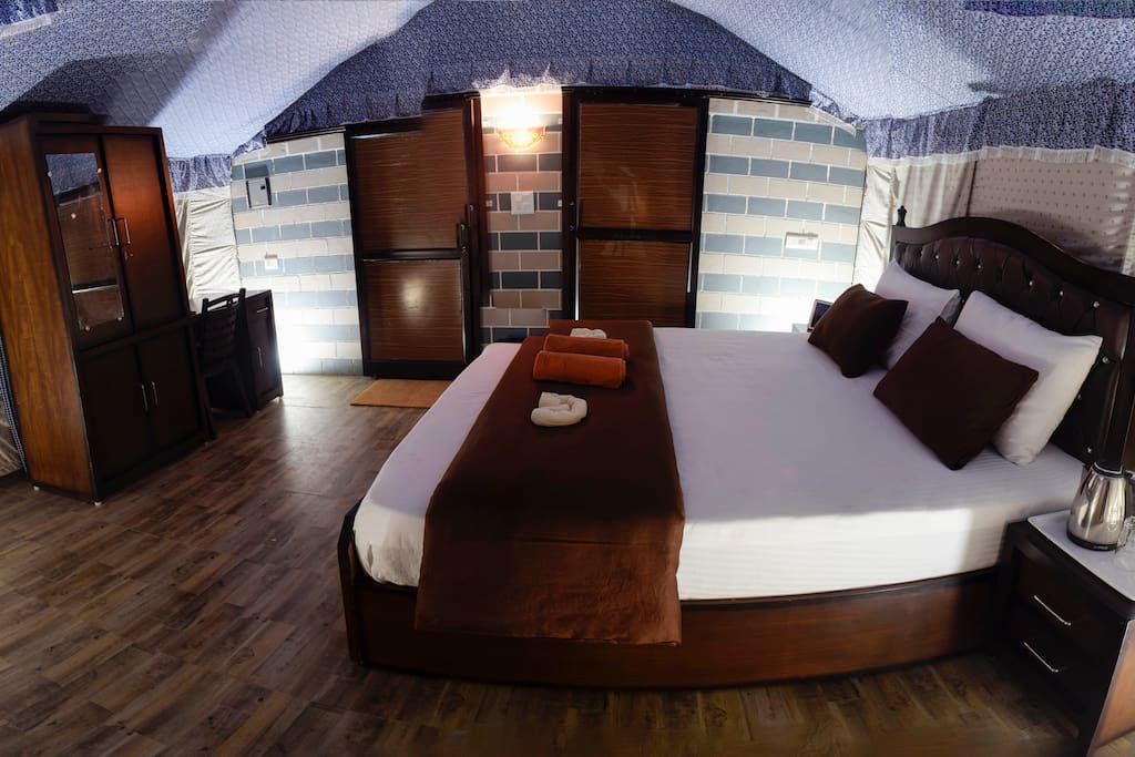Private wardrobe, study table, chair, side tables along with the most comfortable outdoor beds for a GOOD NIGHT sleep!
