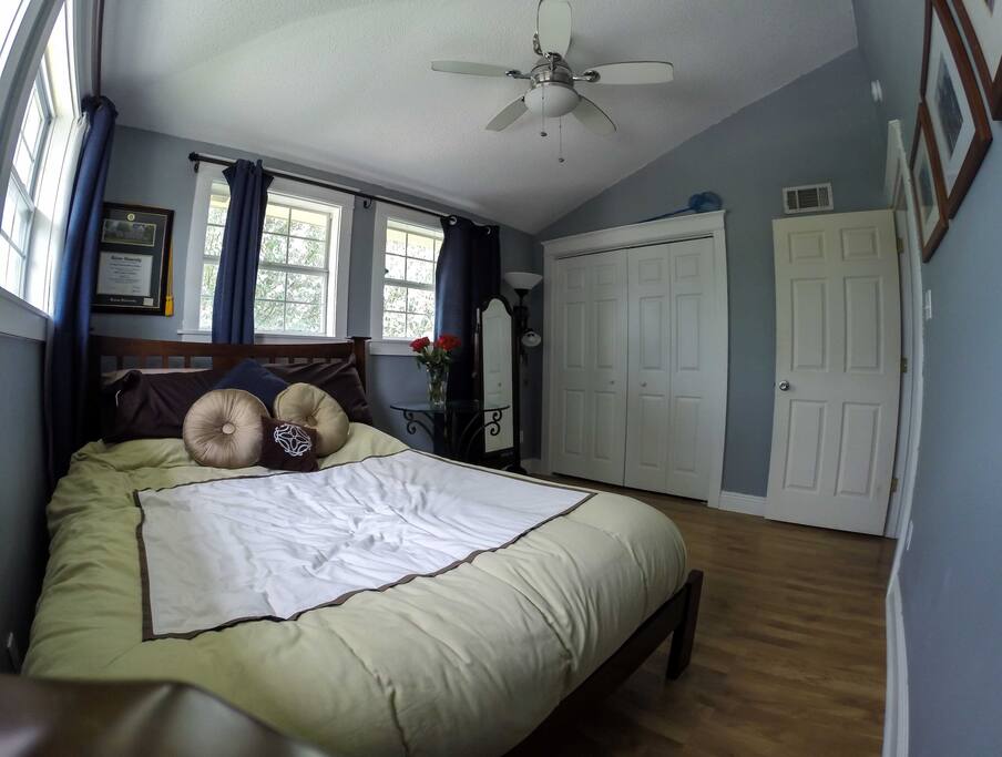 Corner condo with lots of sunlight. Second bedroom pictured here.