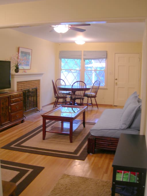 Living room and dining area to back yard