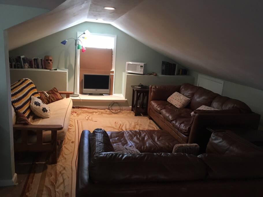 Apartment sitting lounge. Coming soon, fridge,
coffee maker, and blinds.